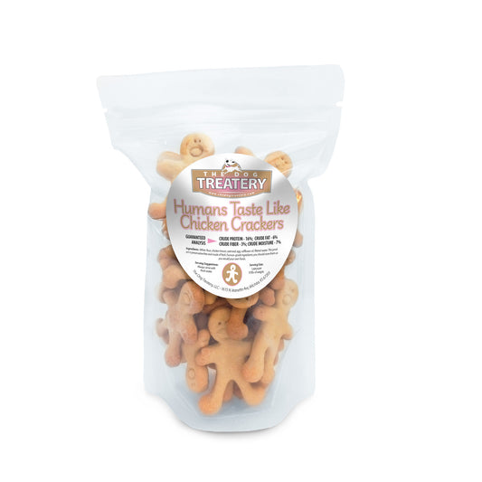 Resealable pouch of Humans Taste Like Chicken Crackers, crunchy chicken dog treats from The Dog Treatery