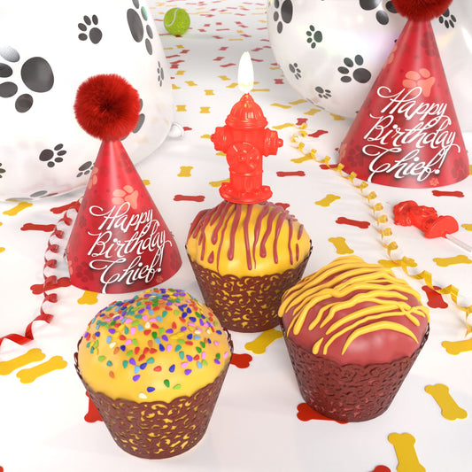 Colorful large PupCup cakes for dogs displayed with birthday hats and festive party decorations