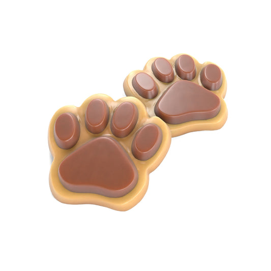 Sweetie Paws peanut butter dog cookies decorated with carob paw-print toes
